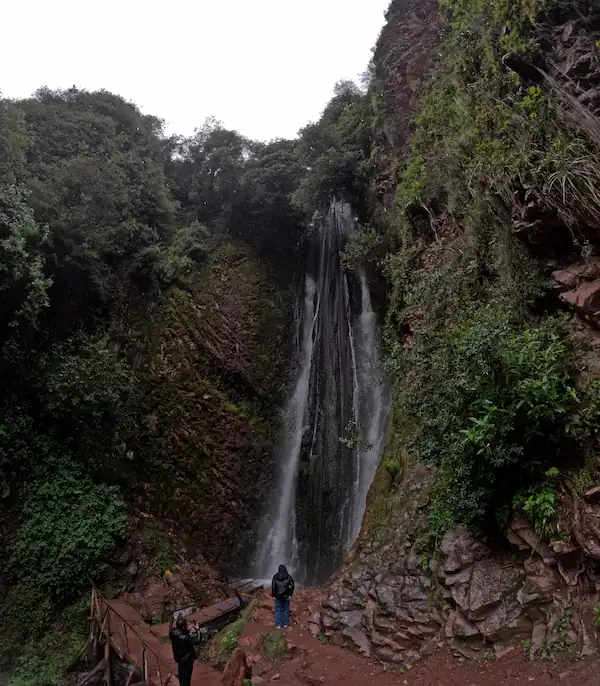 Tourist on a Poc Poc Waterfall hike
