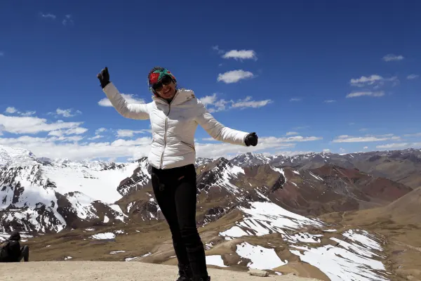 Lady at the top of the Ausangate, one of the highlights of the Rainbow Mountain Full day