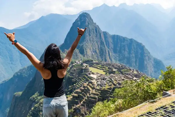 Traveler at Machu Picchu using words in Quechua